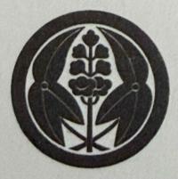 丸に抱き葉桐